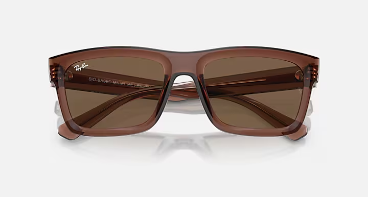 عینک آفتابی ری‌بن مدل Warren (وارن) RB4396 667873 BIO-BASED فریم شفاف قهوه‌ای با عدسی قهوه‌ای زیست‌پایه