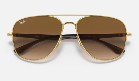 عینک آفتابی ری‌بن مدل RB3683 001/51 با فریم طلایی و عدسی قهوه‌ای هایلایت